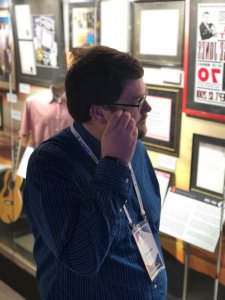 Ryan Southern looking at plaques at the George Jones museum in Nashville.